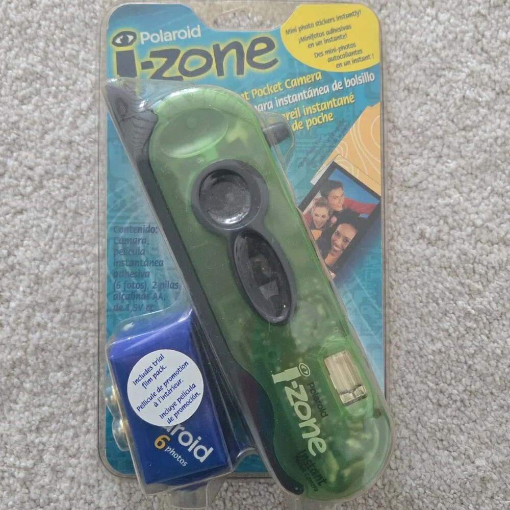 Green vintage izone polaroid camera